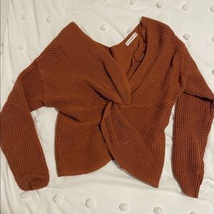 Rust front knot sweater